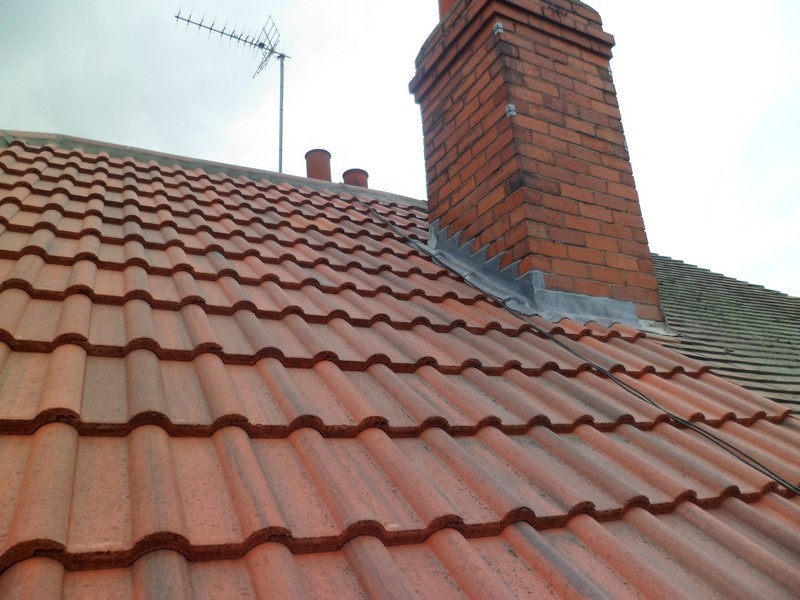 Clay tile roof on British home